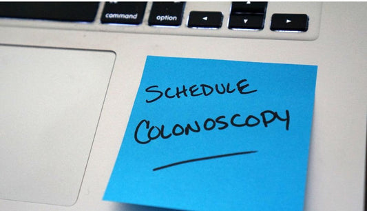 post-it note saying schedule colonoscopy 