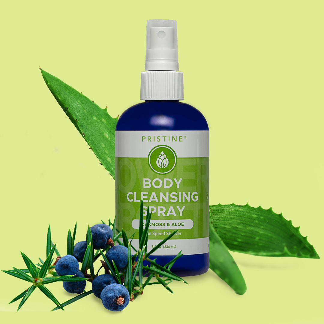 Pristine Body Cleansing Sprays Oakmoss scent with herbs and aloe against green background