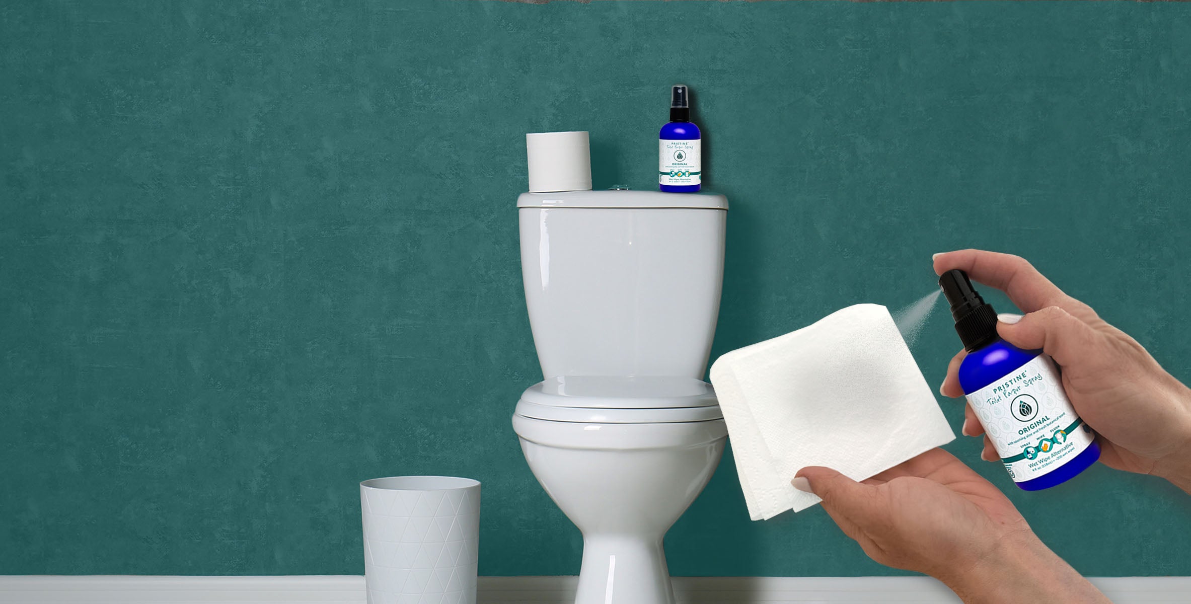 Pristine toilet paper spray wet wipe alternative being sprayed onto toilet paper with toilet in background